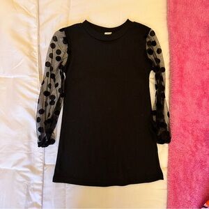 Chic Black Dress with Sheer Polka Dot Sleeves